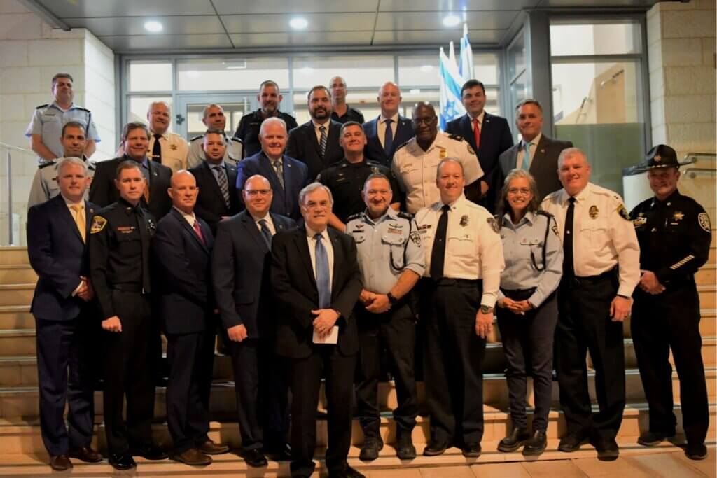16-member delegation representing law enforcement agencies in Georgia, Tennessee, North Carolina and Colorado who participated in the Georgia International Law Enforcement Exchanges (GILEE) annual training program with the Israel Police in November 2021. (Photo: Andrew Young School of Policy Studies/Georgia State University)