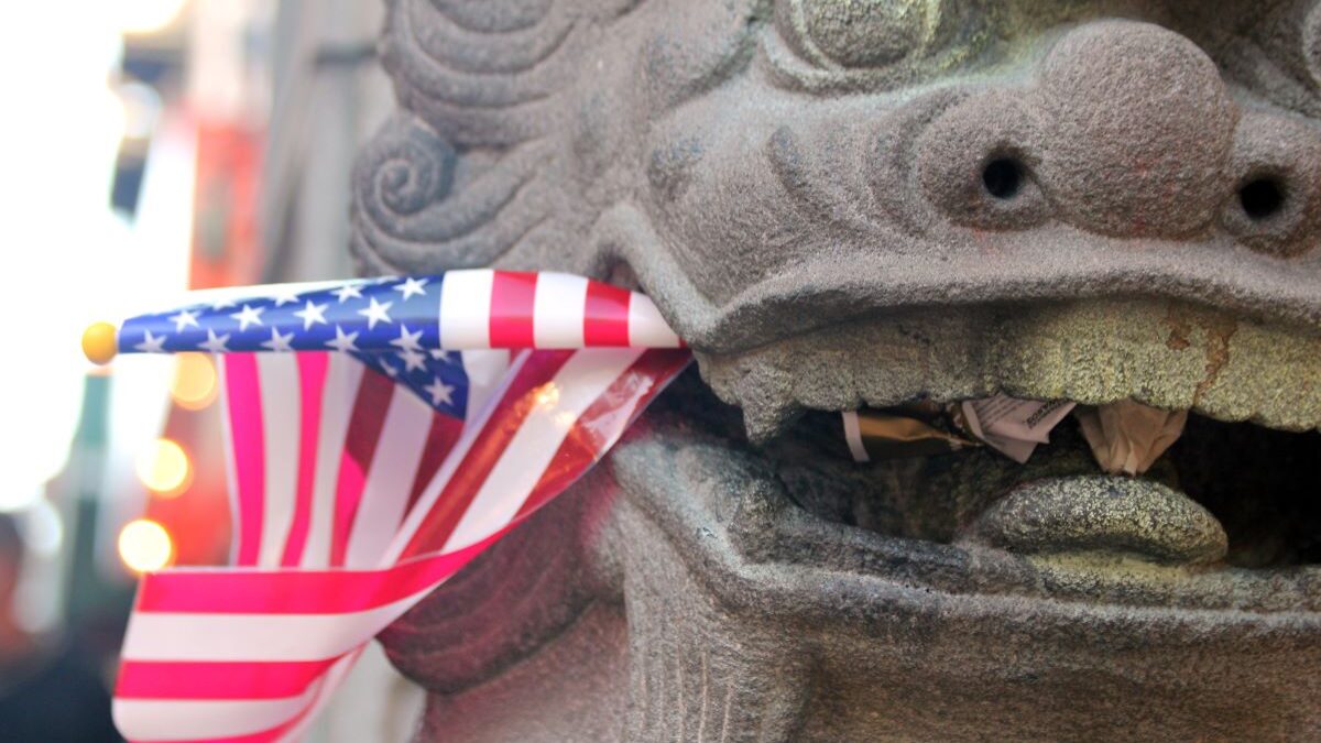 An American flag in a Chinese statue